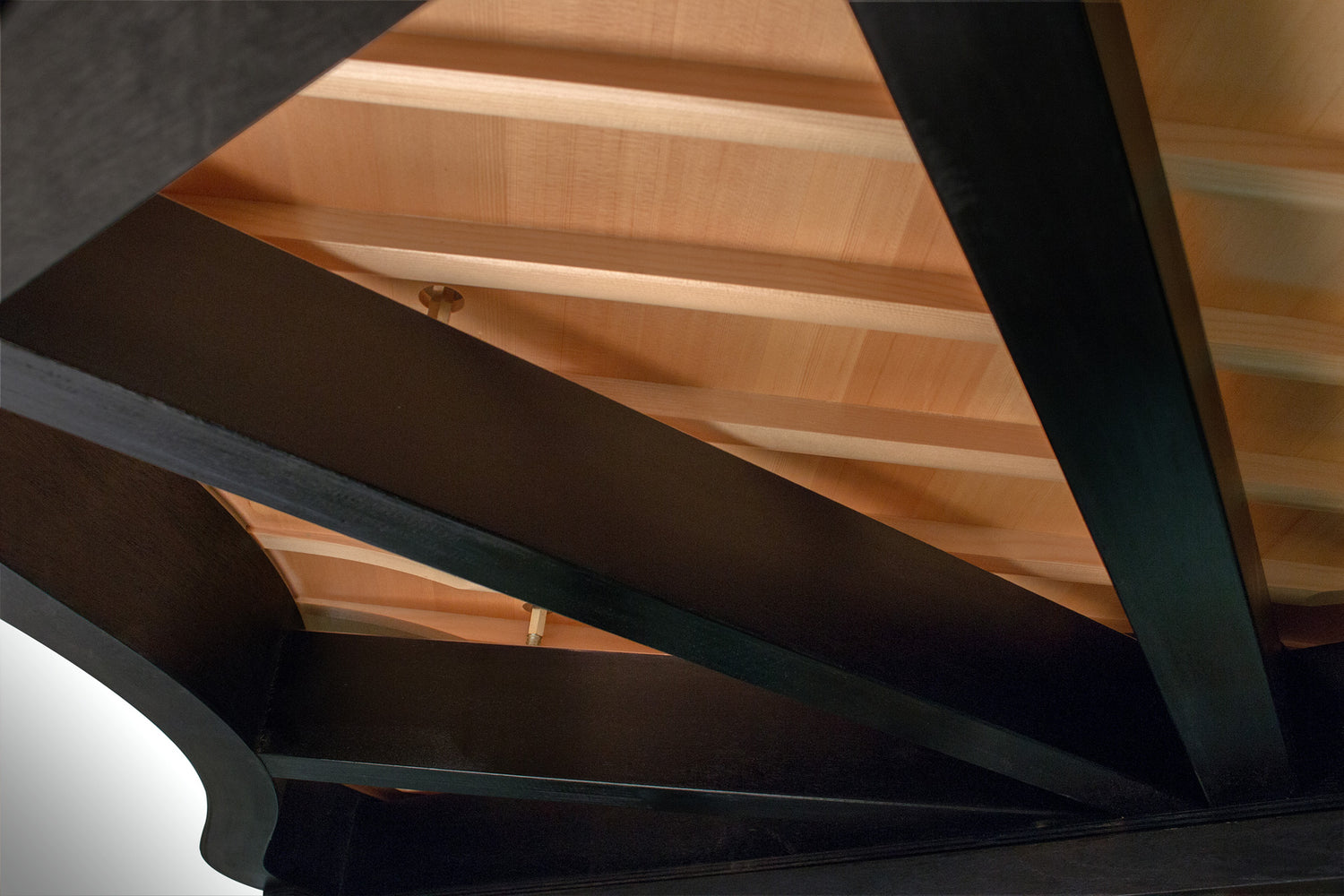 Underside of a Kawai grand piano