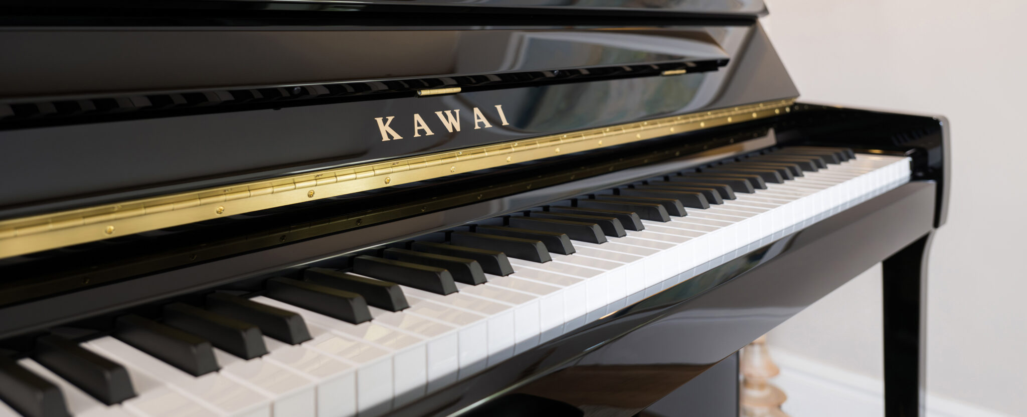 Keys of a Kawai K300 upright piano