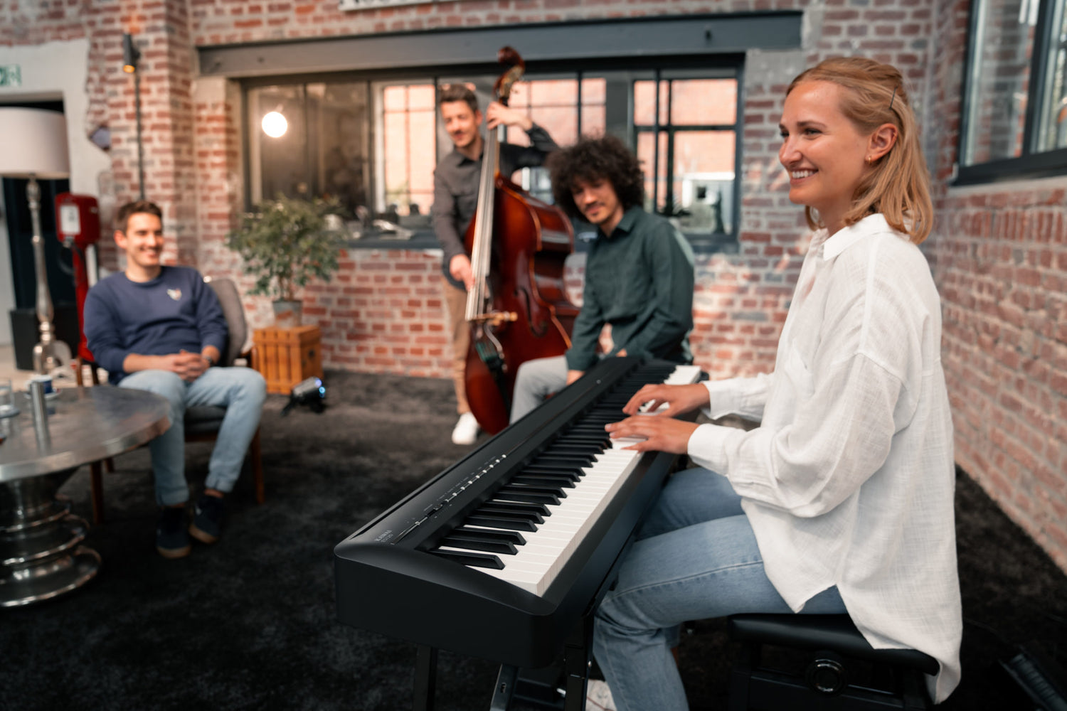 Girl playing the Kawai ES120 to an audience